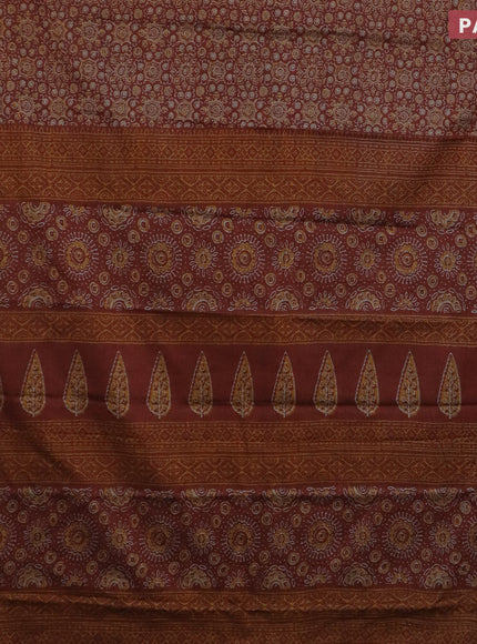 Muslin cotton saree rust shade with allover ajrakh prints and thread woven border