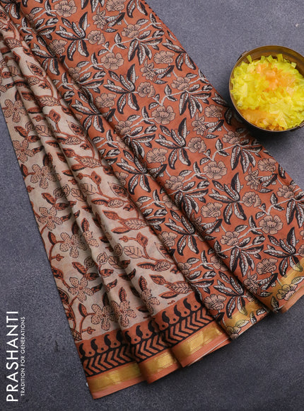 Muslin cotton saree sandal and orange with allover kalamkari prints and small zari woven border