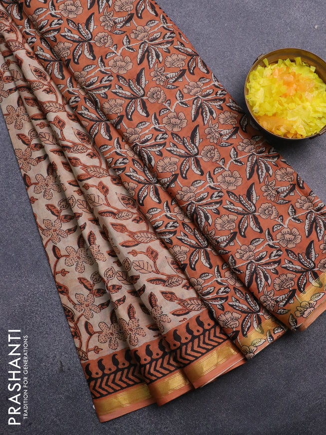 Muslin cotton saree sandal and orange with allover kalamkari prints and small zari woven border