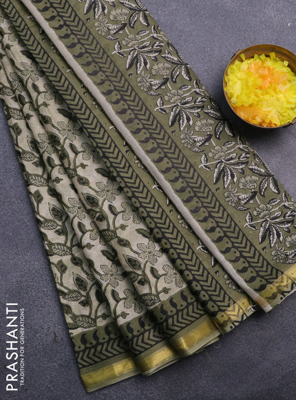 Muslin cotton saree cream and green with allover kalamkari prints and small zari woven border