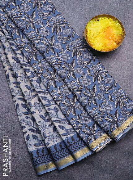 Muslin cotton saree cream and blue with allover kalamkari prints and small zari woven border