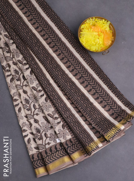 Muslin cotton saree beige and grey with allover kalamkari prints and small zari woven border