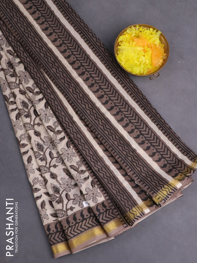 Muslin cotton saree beige and grey with allover kalamkari prints and small zari woven border