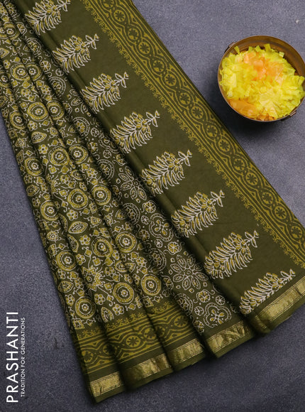 Muslin cotton saree sap green with allover ajrakh prints and small zari woven border