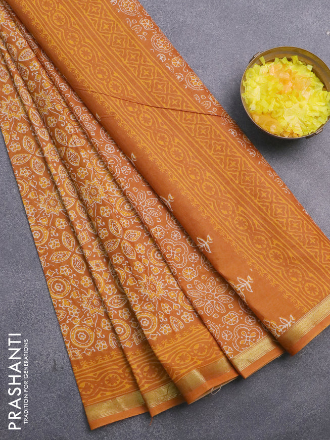 Muslin cotton saree mustard yellow with allover ajrakh prints and small zari woven border