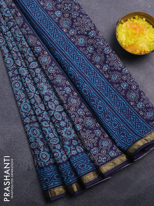 Muslin cotton saree blue with allover ajrakh prints and small zari woven border