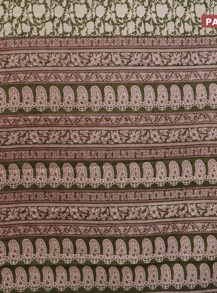 Muslin cotton saree sap green and beige with allover prints and small zari woven border