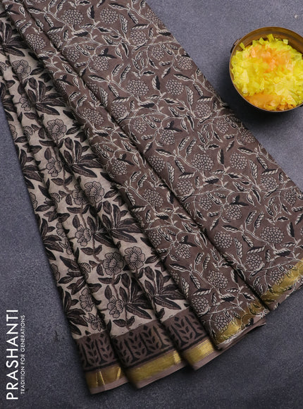 Muslin cotton saree beige and grey with allover floral prints and small zari woven border