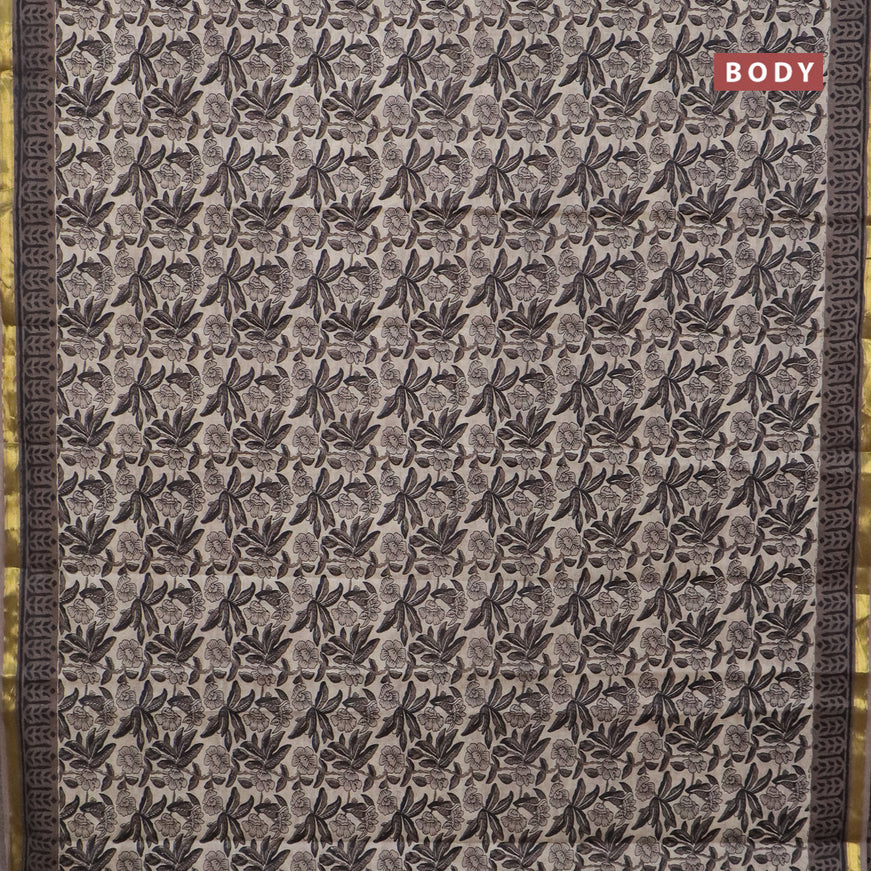 Muslin cotton saree beige and grey with allover floral prints and small zari woven border