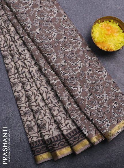 Muslin cotton saree beige and grey with allover floral prints and small zari woven border