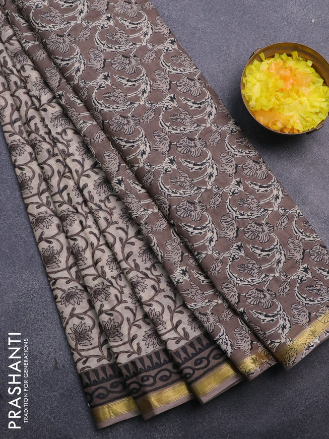 Muslin cotton saree beige and grey with allover floral prints and small zari woven border