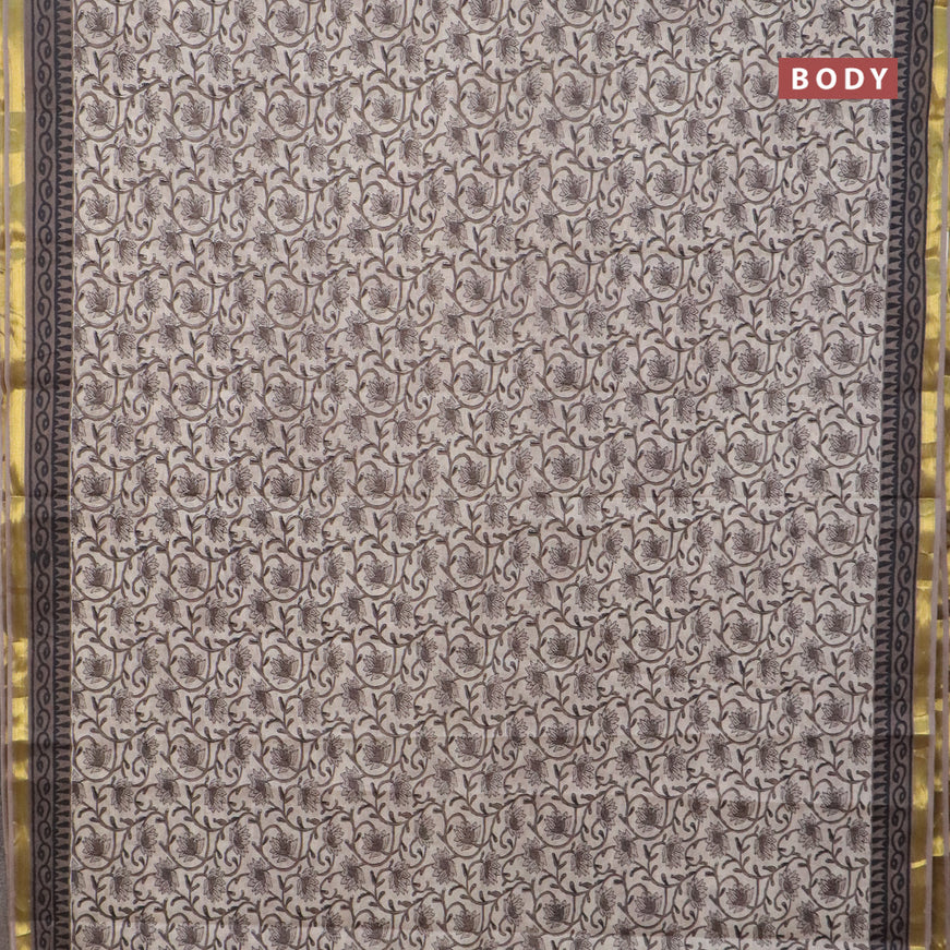 Muslin cotton saree beige and grey with allover floral prints and small zari woven border