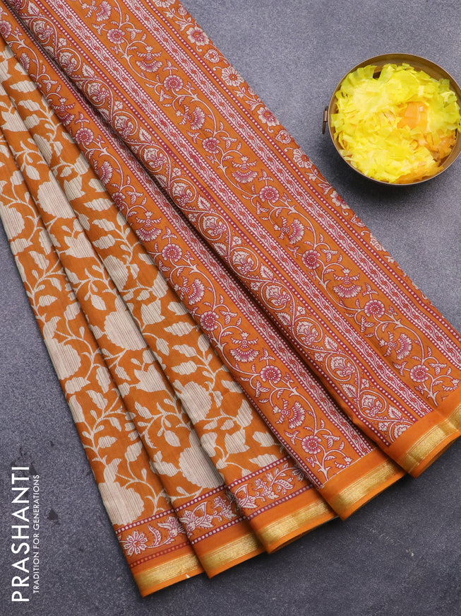 Muslin cotton saree mustard shade and beige with allover prints and small zari woven border