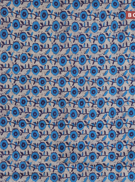 Muslin cotton saree cream and blue with allover prints and small zari woven border