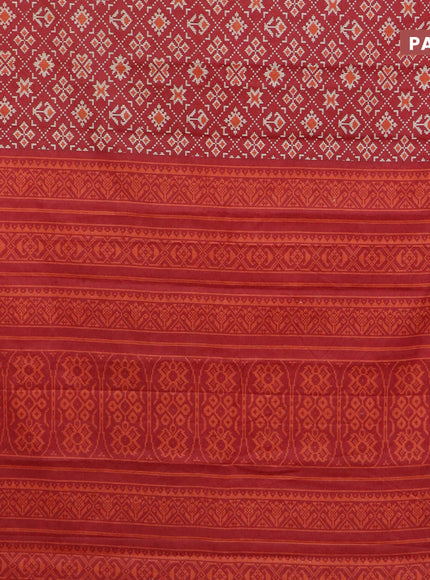 Muslin cotton saree red with allover ikat prints and small zari woven border