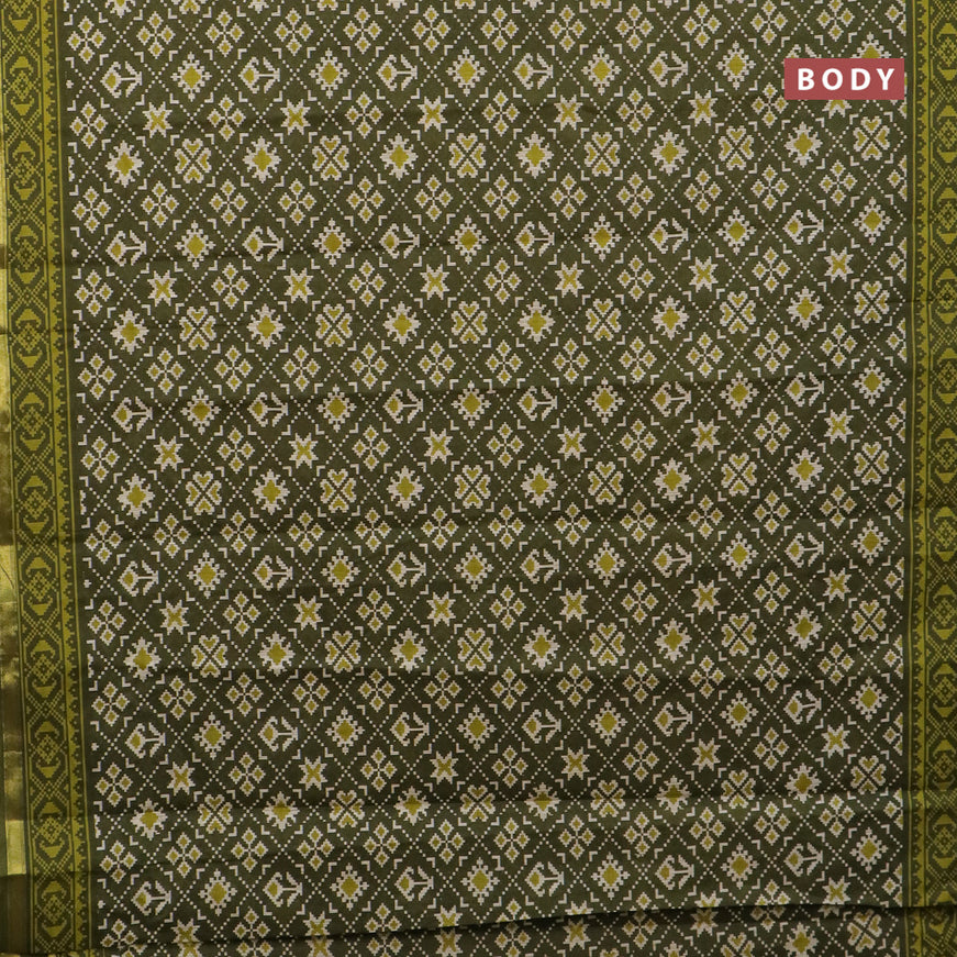 Muslin cotton saree sap green with allover ikat prints and small zari woven border