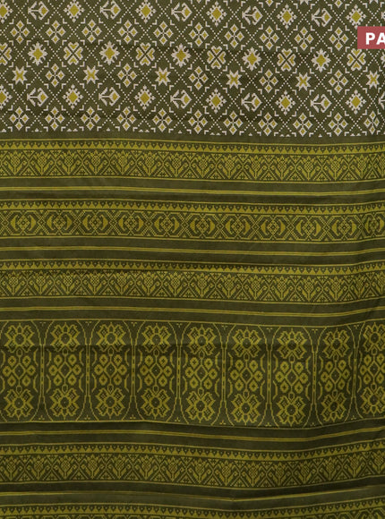 Muslin cotton saree sap green with allover ikat prints and small zari woven border