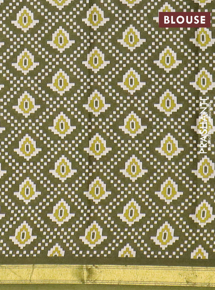 Muslin cotton saree sap green with allover ikat prints and small zari woven border