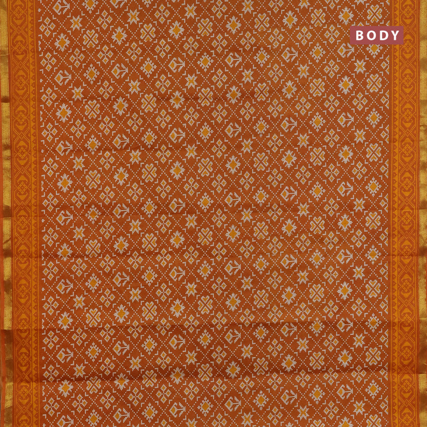 Muslin cotton saree dark mustard with allover ikat prints and small zari woven border