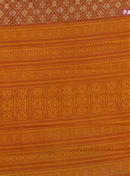 Muslin cotton saree dark mustard with allover ikat prints and small zari woven border