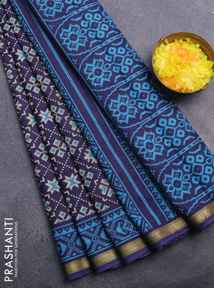 Muslin cotton saree blue with allover ikat prints and small zari woven border