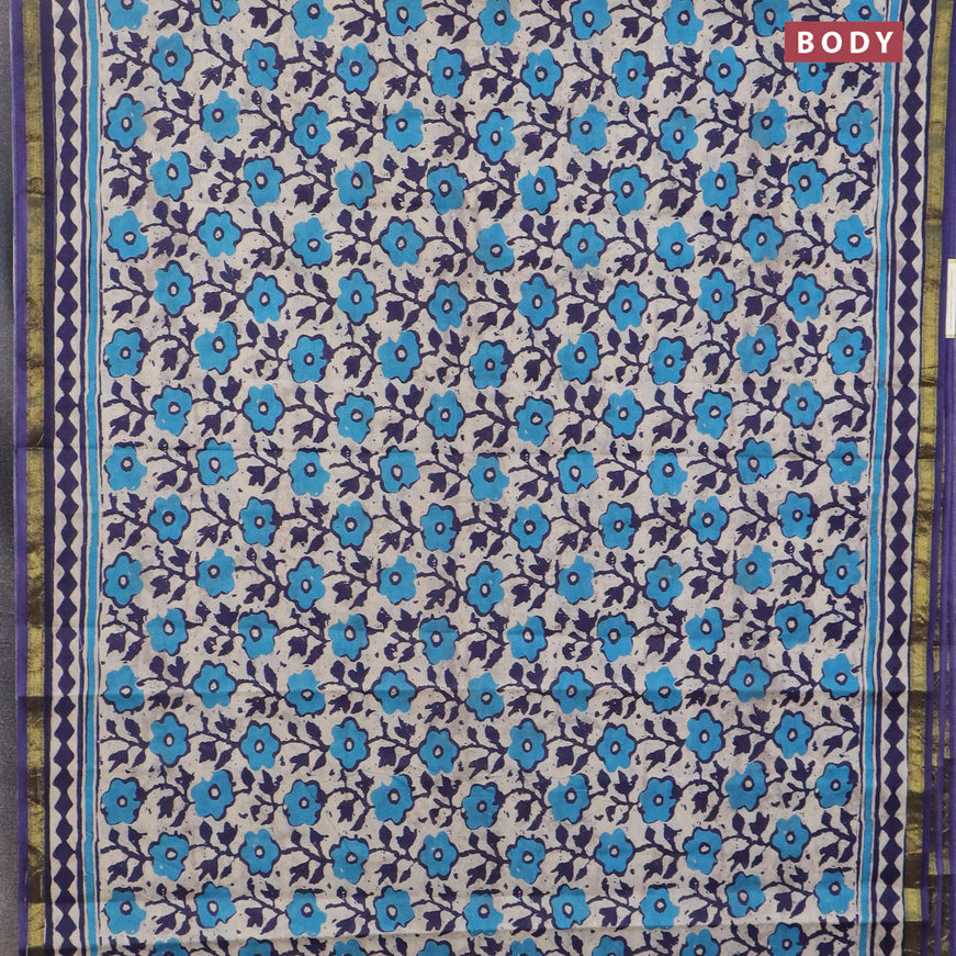 Muslin cotton saree cream and blue with allover prints and small zari woven border