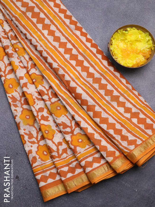 Muslin cotton saree cream and mango yellow with allover prints and small zari woven border