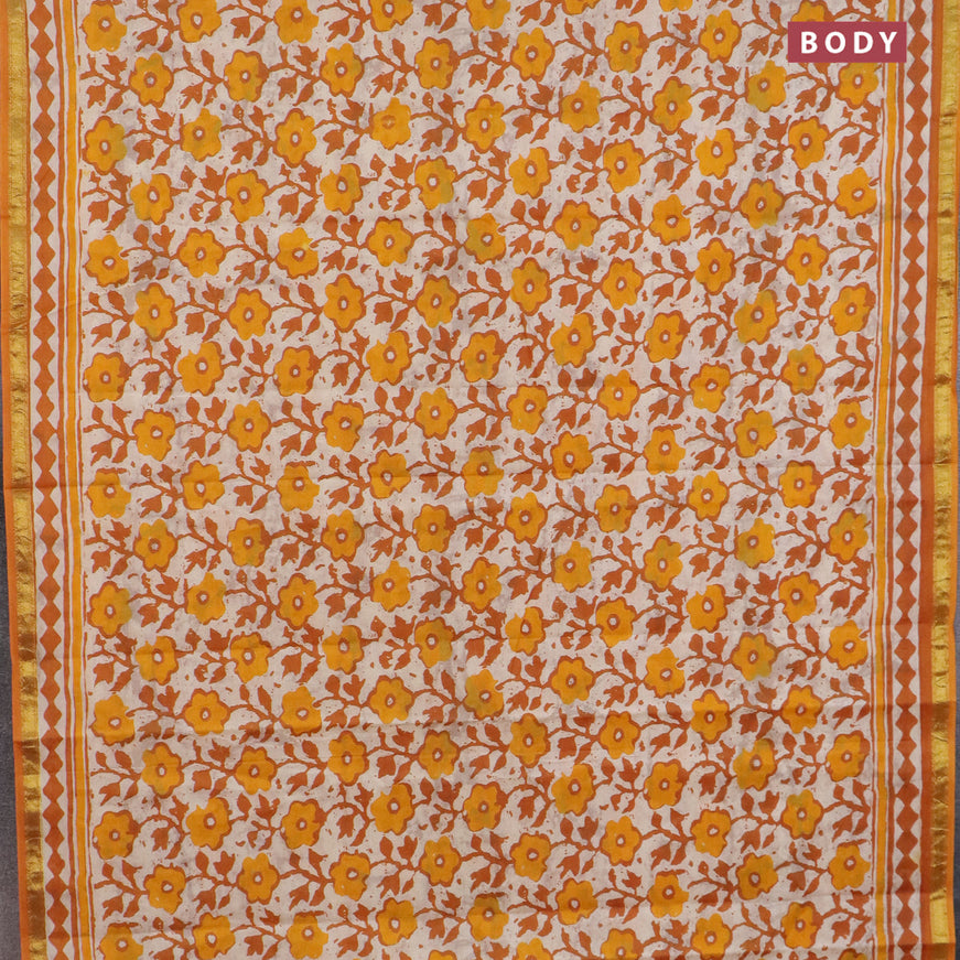 Muslin cotton saree cream and mango yellow with allover prints and small zari woven border