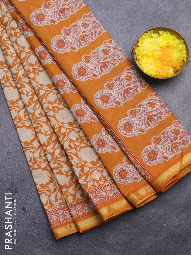 Muslin cotton saree mustard yellow and beige with allover prints and small zari woven border