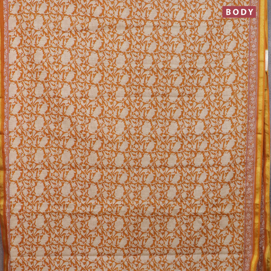 Muslin cotton saree mustard yellow and beige with allover prints and small zari woven border