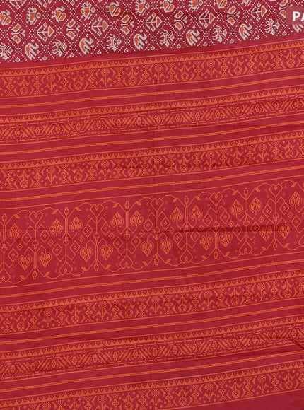 Muslin cotton saree red with allover patola prints and small zari woven border