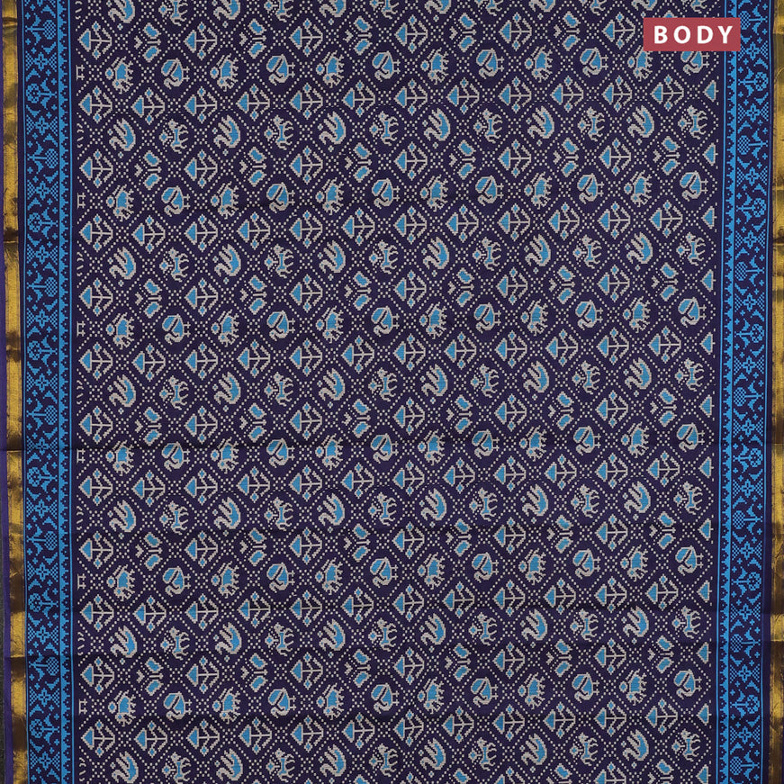 Muslin cotton saree blue with allover patola prints and small zari woven border