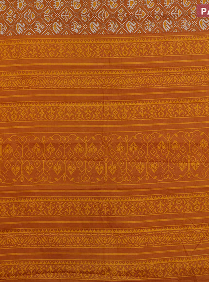 Muslin cotton saree mustard yellow with allover patola prints and small zari woven border