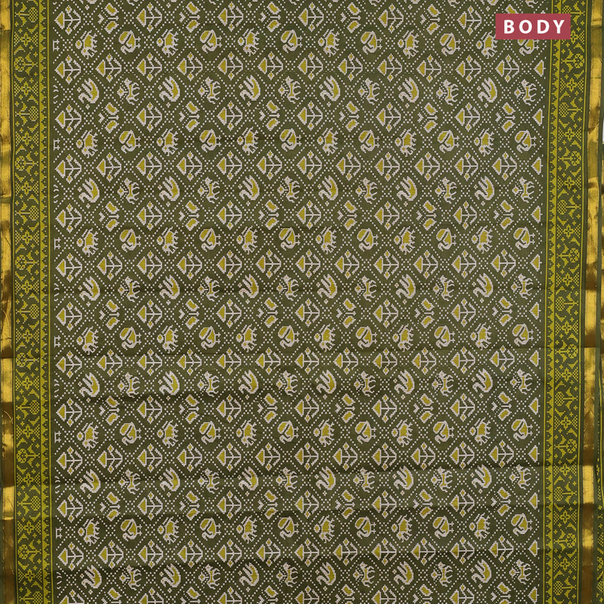 Muslin cotton saree sap green with allover patola prints and small zari woven border