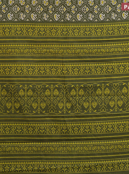 Muslin cotton saree sap green with allover patola prints and small zari woven border