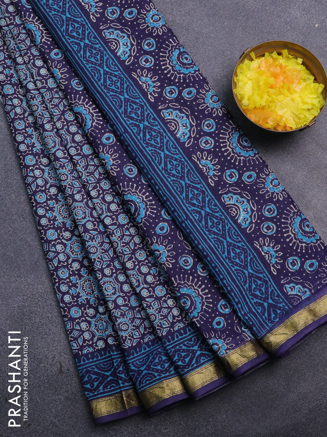 Muslin cotton saree blue with allover ajrakh prints and small zari woven border