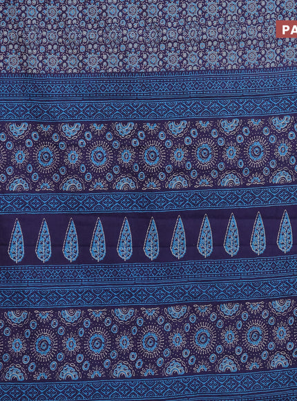 Muslin cotton saree blue with allover ajrakh prints and small zari woven border