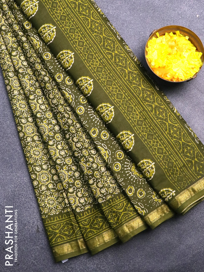 Muslin cotton saree sap green with allover ajrakh prints and small zari woven border