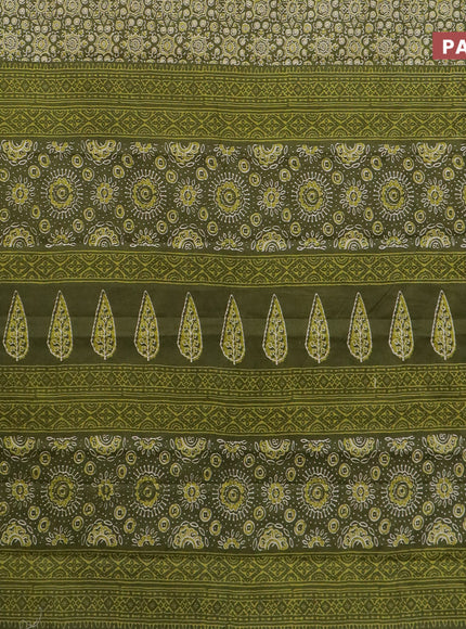 Muslin cotton saree sap green with allover ajrakh prints and small zari woven border