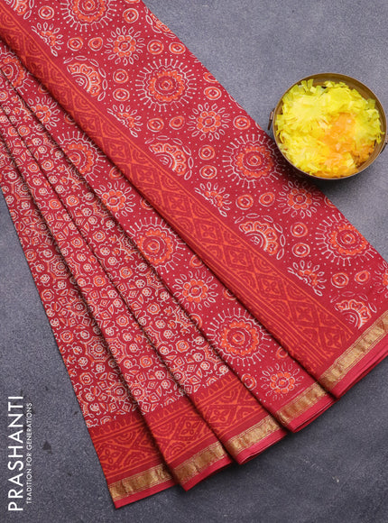 Muslin cotton saree red with allover ajrakh prints and small zari woven border