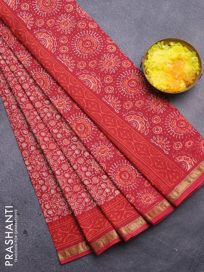 Muslin cotton saree red with allover ajrakh prints and small zari woven border