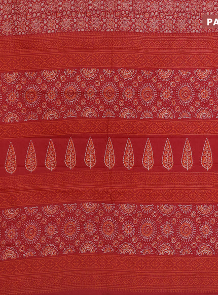 Muslin cotton saree red with allover ajrakh prints and small zari woven border