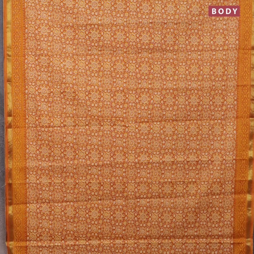 Muslin cotton saree mustard yellow with allover ajrakh prints and small zari woven border