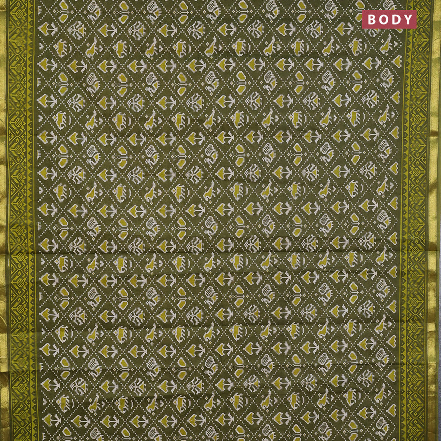 Muslin cotton saree sap green with allover patola prints and small zari woven border