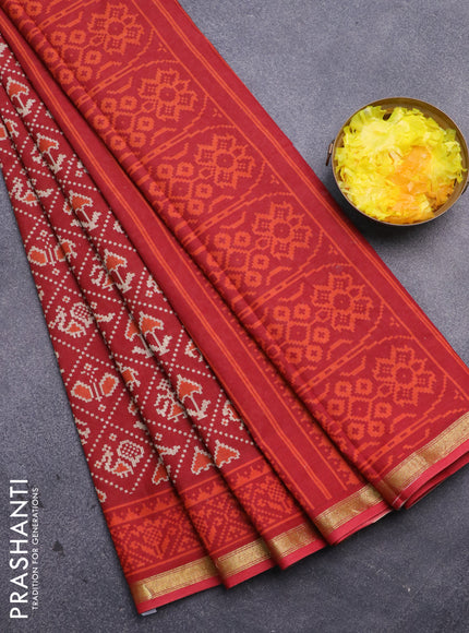 Muslin cotton saree red with allover patola prints and small zari woven border