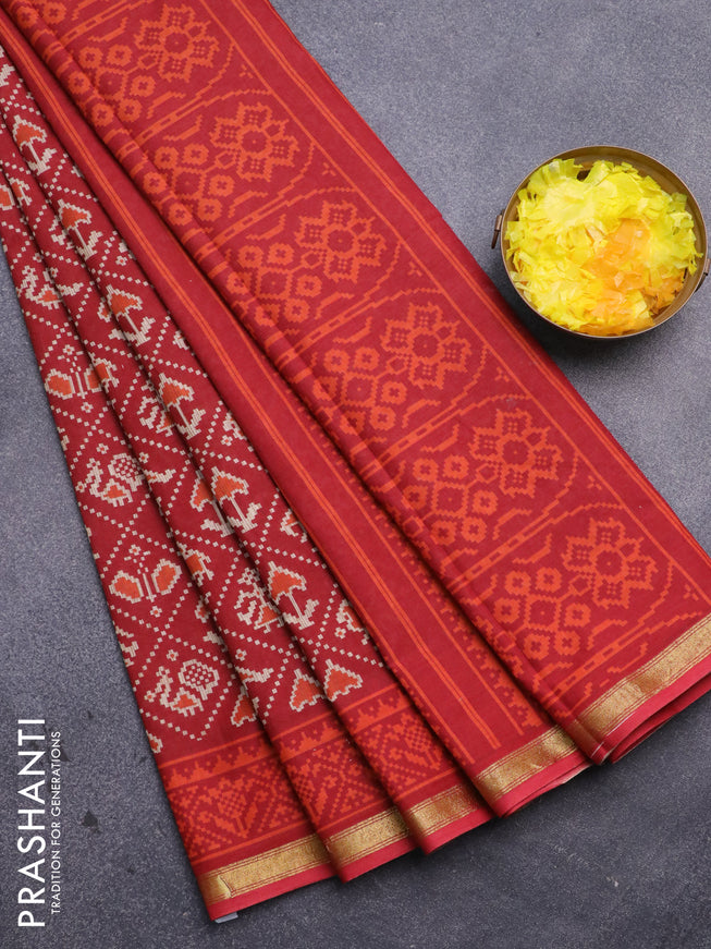 Muslin cotton saree red with allover patola prints and small zari woven border