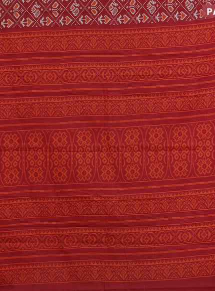 Muslin cotton saree red with allover patola prints and small zari woven border