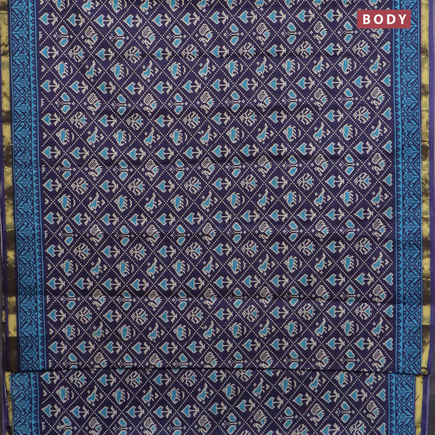 Muslin cotton saree blue with allover patola prints and small zari woven border