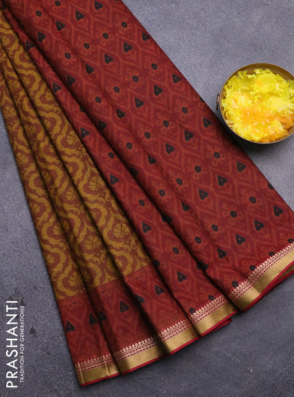 Muslin cotton saree dark mustard and maroon with allover prints and printed border