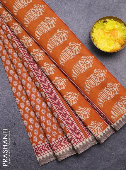 Muslin cotton saree orange and beige with allover floral butta prints and printed border